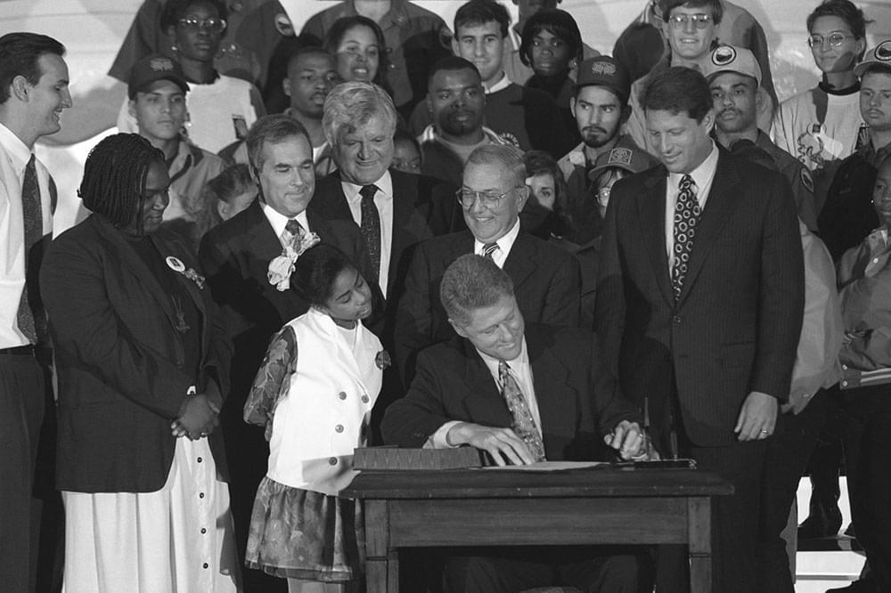 Bill Clinton signing