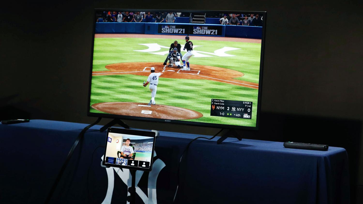 Luke Post playing video games with the Yankees