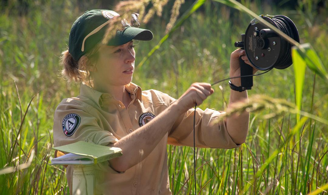 AmeriCorps member Jennifer Cramer is a Geoscientists-in-the-Parks participant at Colonial National Historical Park in Virginia. Jennifer is particularly proud of the work she’s done to collect data to monitor groundwater responses to extreme weather. 